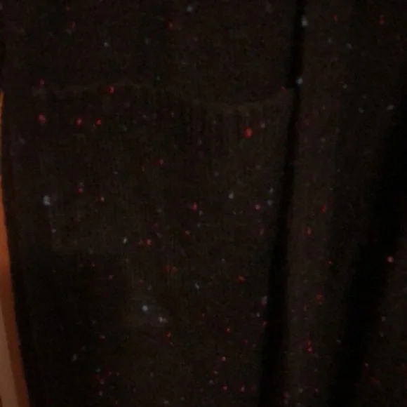 Long sweater jacket with belt.  Black with a few colored fabric spots. - Picture 7 of 7